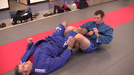 Coach Vladislav Koulikov demonstrating a leg lock.